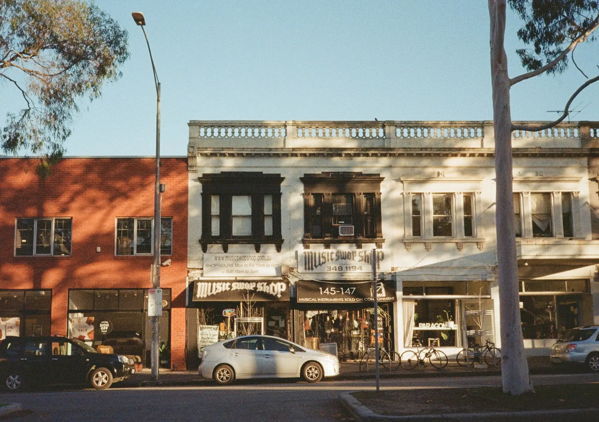 Two-storey commercial building with ground-floor shops on a Wellington street